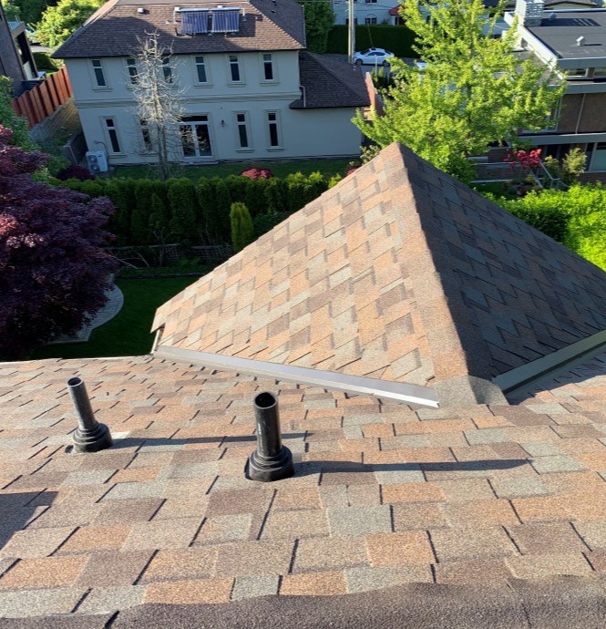 Aerial view of brown colored shingles on a residential home