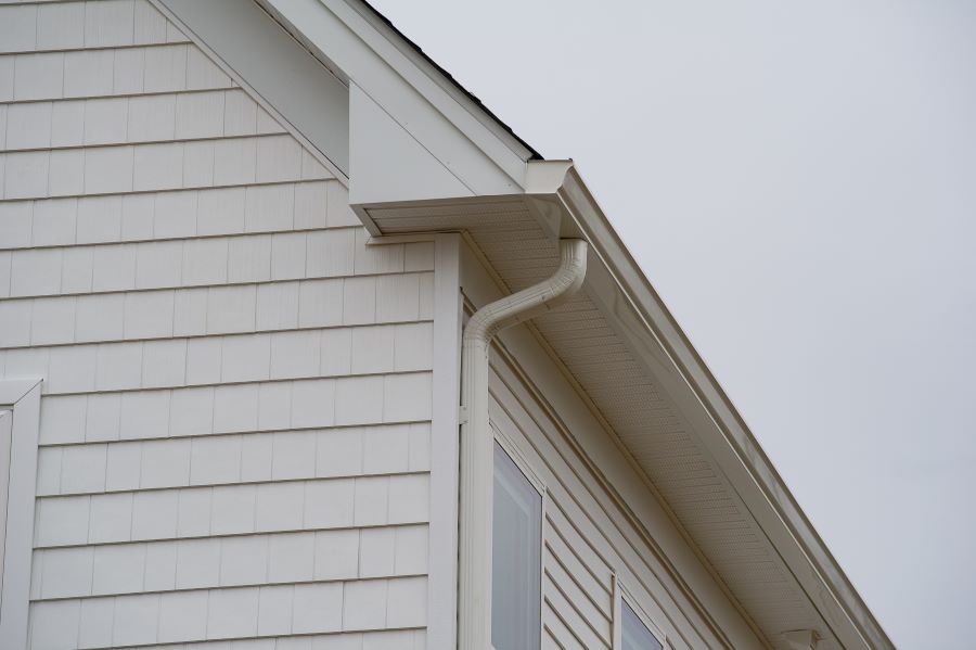 Close up of cream colored seamless gutter 